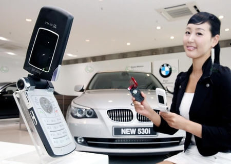 Samsung и BMW вместе обнародовали SCH-B750 и 5 серию. Фото.