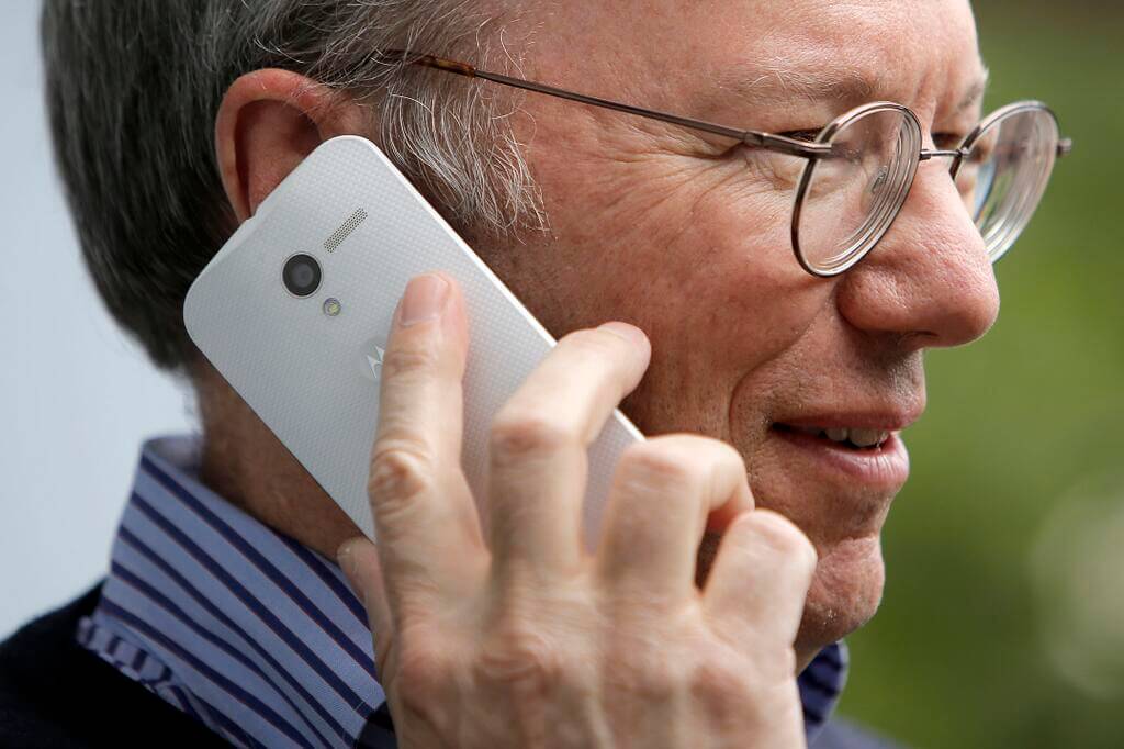 Eric Schmidt using Moto X phone