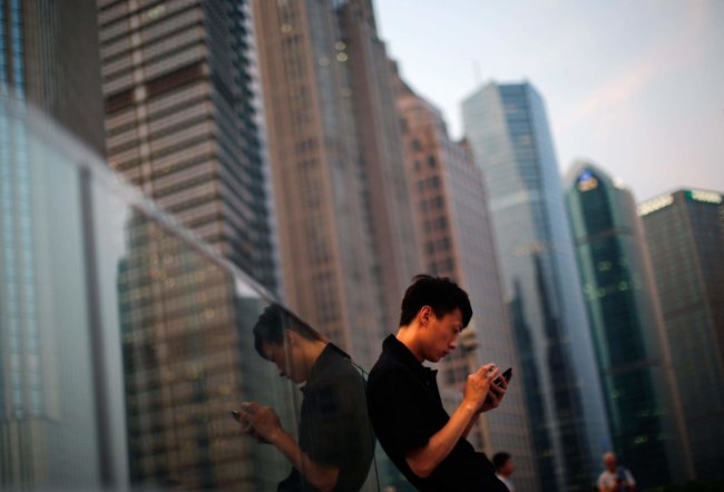 В Китае чаще выходят в Интернет со смартфонов. Фото.