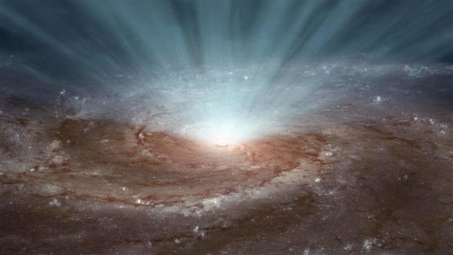 Сверхмассивная черная дыра в галактике PDS 456 выделяет энергию триллиона солнц. Фото.