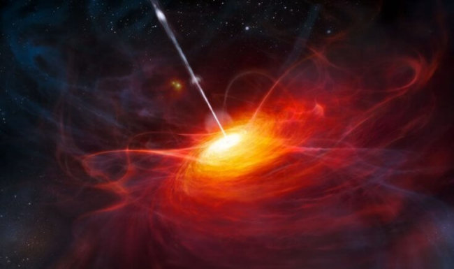 Открыта рекордно тяжелая черная дыра в центре древнего квазара. Фото.