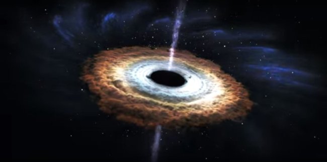 #видео дня | Массивная чёрная дыра поглощает звезду. Фото.