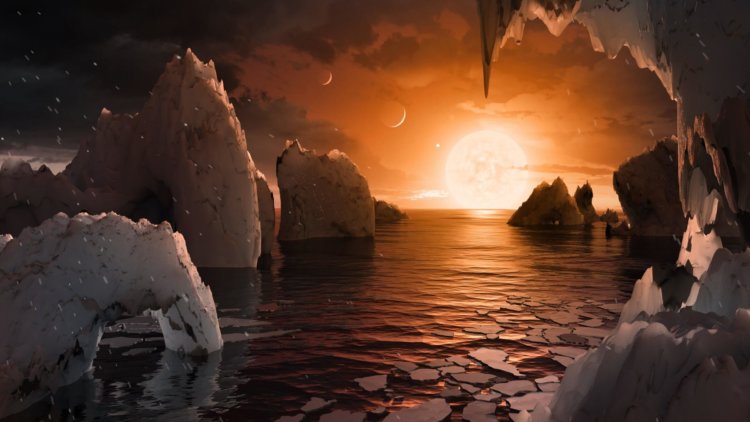 TRAPPIST-1 — пристанище внеземной жизни? Иллюстрация того, как может выглядеть поверхность планеты TRAPPIST-1f, расположенной в 39 световых годах от Земли. Фото.
