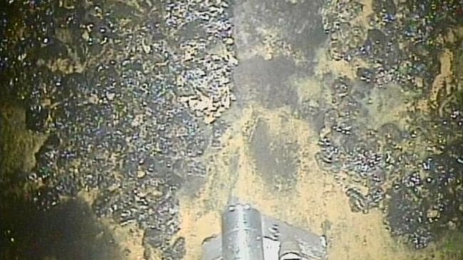 Мощная радиация внутри «Фукусимы-1» в буквальном смысле поджаривает робота-уборщика. Фото.