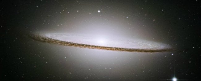 Астрономы выяснили, почему галактики обладают разной формой. Фото.