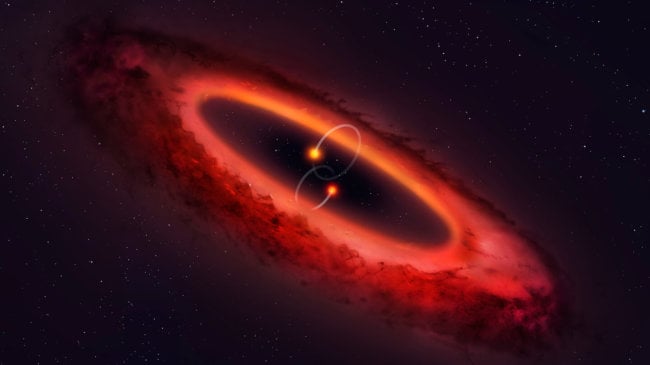 Астрономы рассказали о системе с уникальным протопланетным диском. Фото.