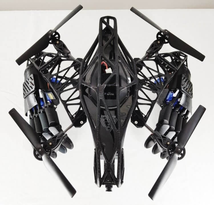 Квадрокоптер впервые оснастили механическими руками, но какой от них толк? Механические руки для дрона — зачем они нужны? Фото.