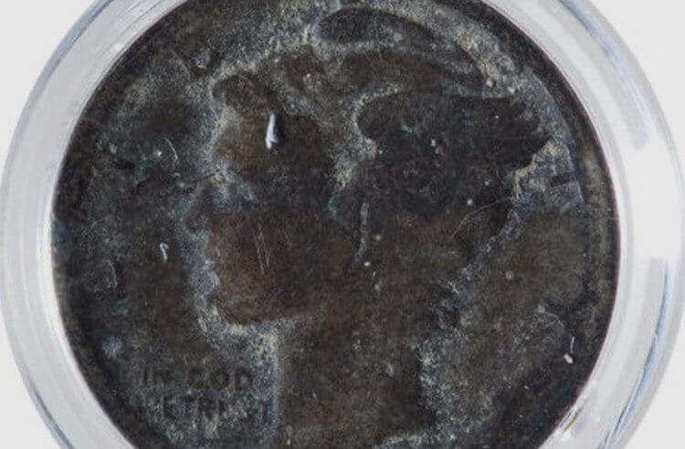 Монеты побывавшие в космосе. Монета, пролежавшая на дне океана около 40 лет внутри спускаемой капсулы. Фото.