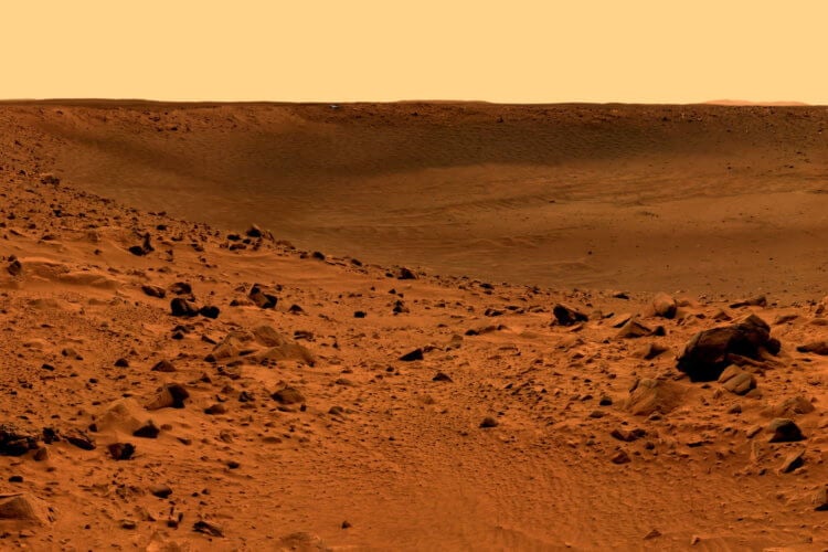 Можно ли выжить на Марсе? Красный реголит, покрывающий поверхность Марса, практически полностью состоит из оксида железа и кремнезема. Фото.