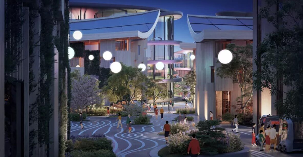 Ночной вид города Woven City. Фото.