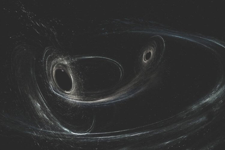 Причина всплеска гравитационных волн. Гравитационные волны образуются из-за столкновения двух черных дыр. Фото.