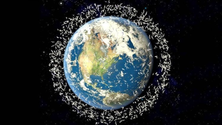 Чем опасен космический мусор? Примерно так выглядит Земля в окружении космического мусора. Фото.