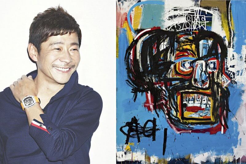 Юсаку Маэдзава и купленная им картина Жан-Мишеля Баския. Фото.