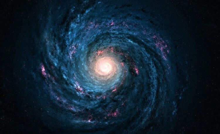 Как образовалась темная материя? Темная материя в составе галактик помогает им не терять звезды во время движения. Фото.