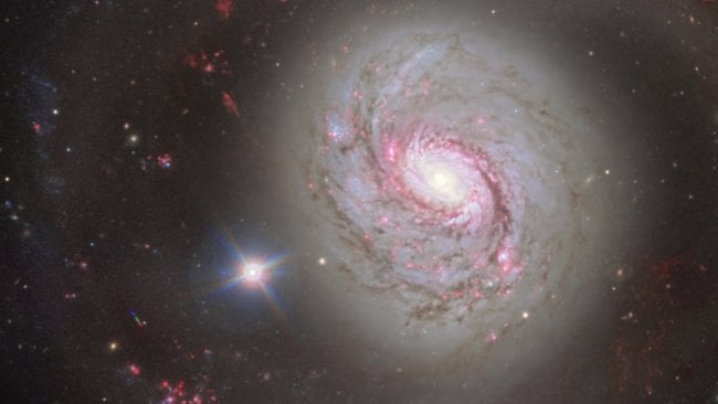 Почему некоторые галактики спиральной формы? Фото.