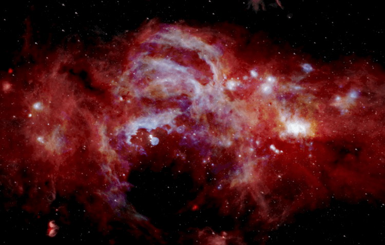 Черные дыры в центрах галактик. Составное инфракрасное изображение центра Млечного Пути. Фото.