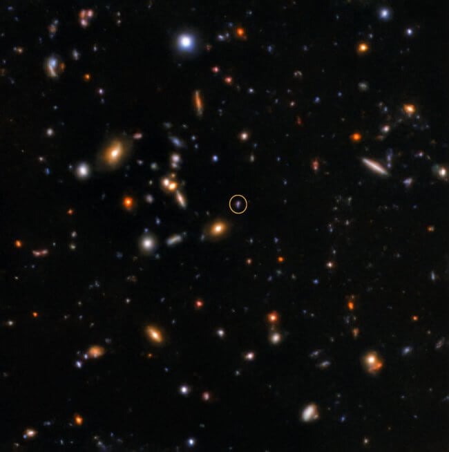 Астрономы обнаружили последствия самой древней вспышки в наблюдаемой Вселенной. Фото.