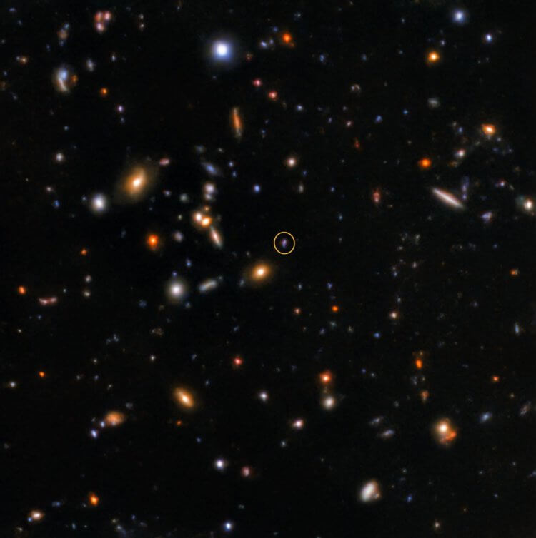 Астрономы обнаружили последствия самой древней вспышки в наблюдаемой Вселенной. Послесвечение SGRB181123B, захваченное телескопом Gemini North. Послесвечение отмечено кружком. Фото.