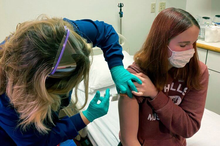Будет ли вакцина от коронавируса бесплатной? Испытания вакцины Pfizer на добровольцах, фото NY Times. Фото.
