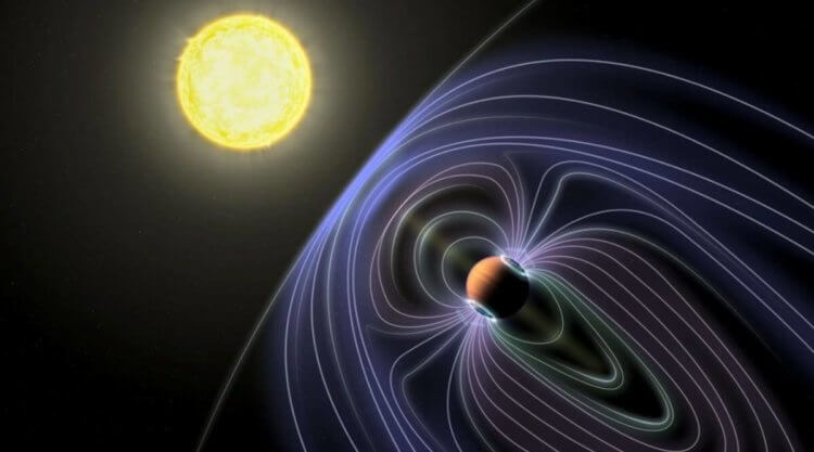 Тайны Проксимы Центавра. Звездная система в представлении художника. На рисунке показаны линии, представляющие невидимое магнитное поле, защищающее горячую планету от солнечного ветра. Фото.