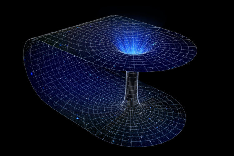 Можно ли путешествовать сквозь черные дыры? Червоточины могут связывать далекие участки Вселенной, подобно тоннелю. Фото.
