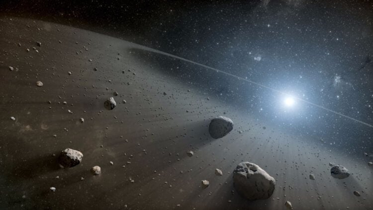 Обитатели Солнечной системы. Между Марсом и Юпитером расположился пояс астероидов, заполненный ледяными и каменными объектами. Фото.