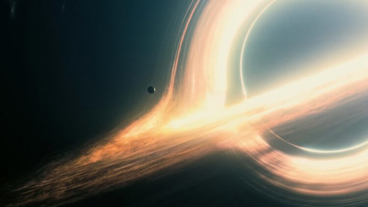 Изменение роли гравитации. Такой черную дыру увидели создатели фильма «Интерстеллар». Фото.