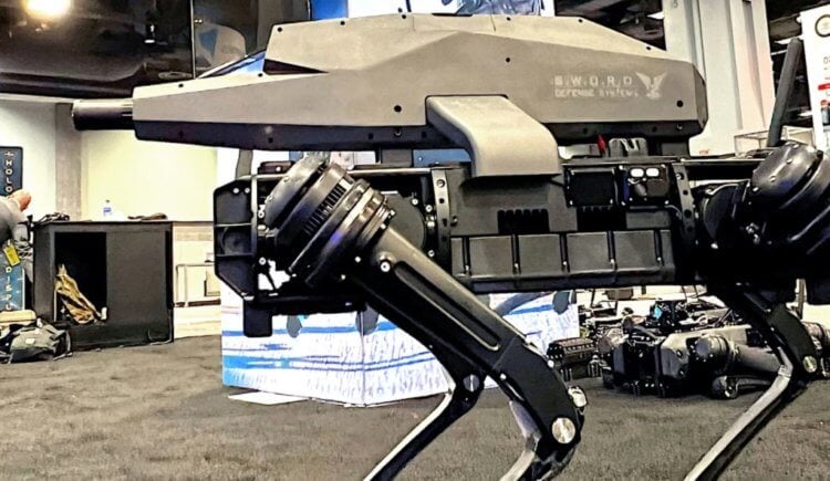 В США разработан робот-собака со встроенной винтовкой. Четвероногий робот с винтовкой SPUR. Фото.