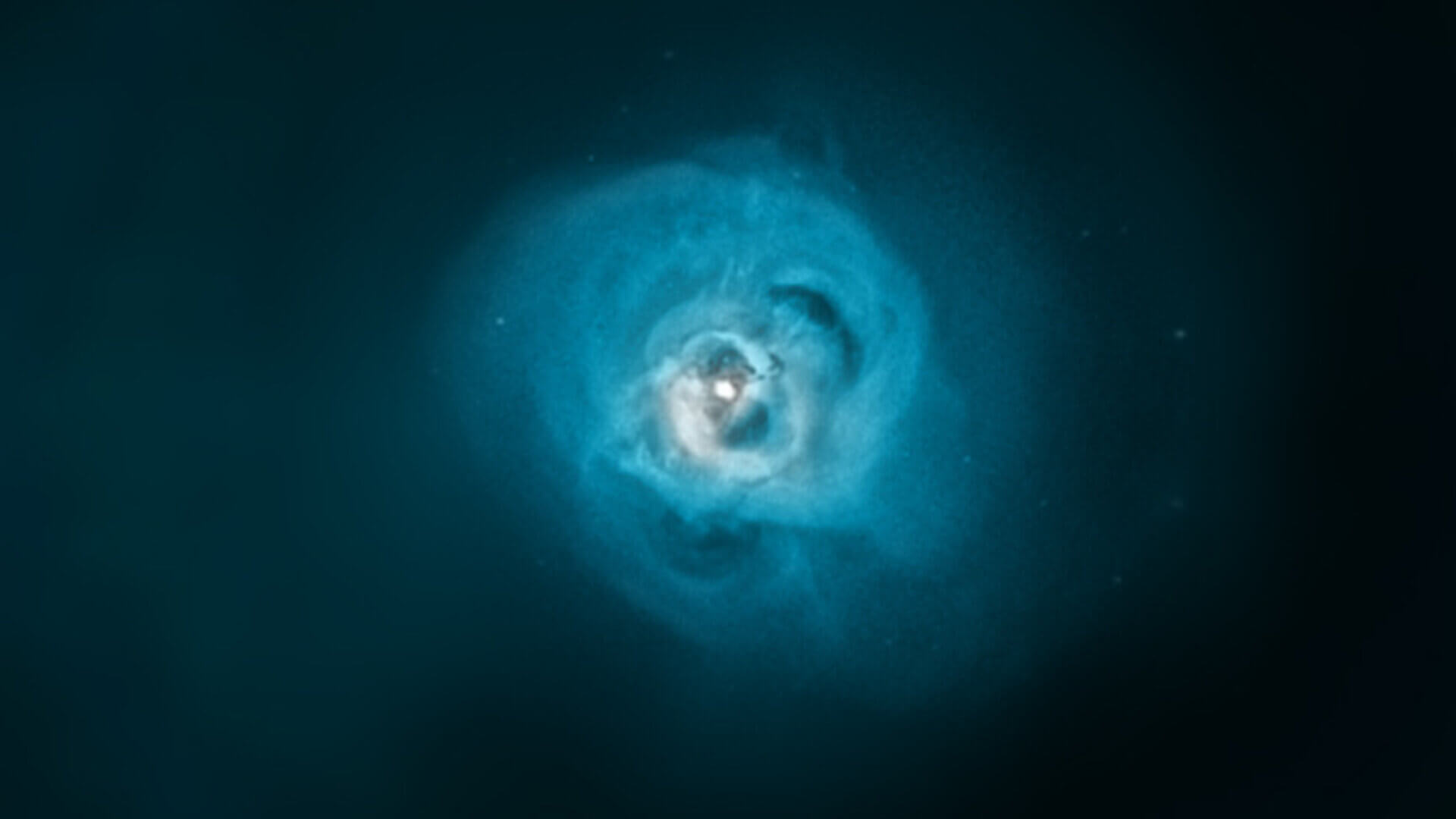 Так как темная материя не вступает в электромагнитное взаимодействие с фотонами света, наблюдать ее непосредственно невозможно. Фото.