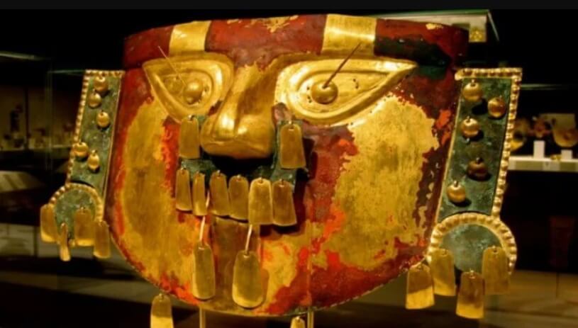 Массовое отравление ртутью. Маска сиканской культуры, покрашенная киноварью. Фото.