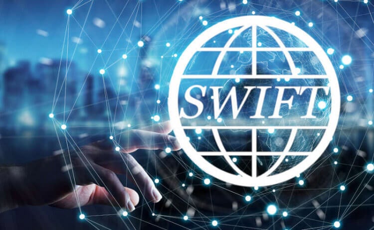Что такое SWIFT и может ли современная банковская система обойтись без него? SWIFT — международная межбанковская система передачи информации и совершения платежей. Фото.