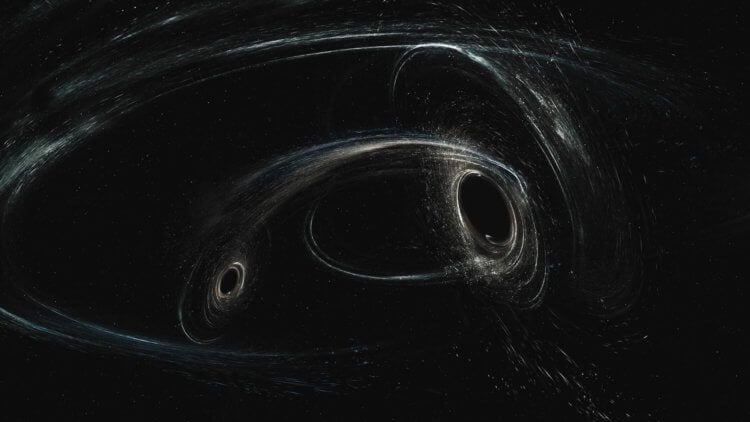 Что странного в столкновении нескольких черных дыр? И причем тут гравитационные волны? Сверхмассивные черные дыры при столкновении друг с другом ведут себя странно. Фото.