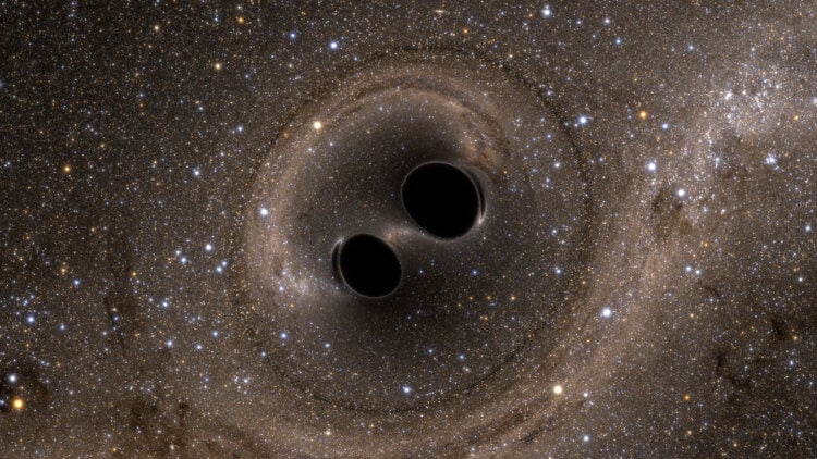 Космическая музыка. Столкновение двух черных дыр порождает гравитационные волны. Фото.
