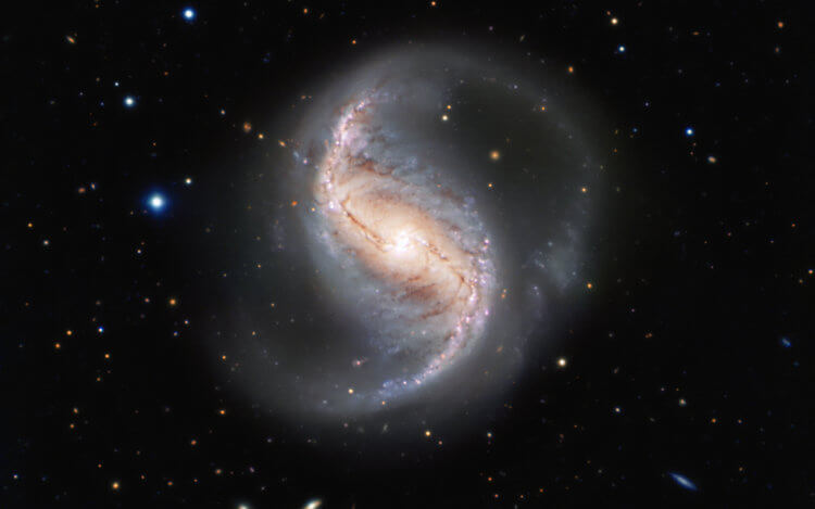 Темная материя внутри галактик. Перел вами спиральная галактика NGC 986. Фото.
