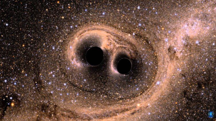 Может ли гравитация создавать свет? Гравитационные волны удалось обнаружить благодаря столкновению двух сверхмассивных черных дыр. Фото.