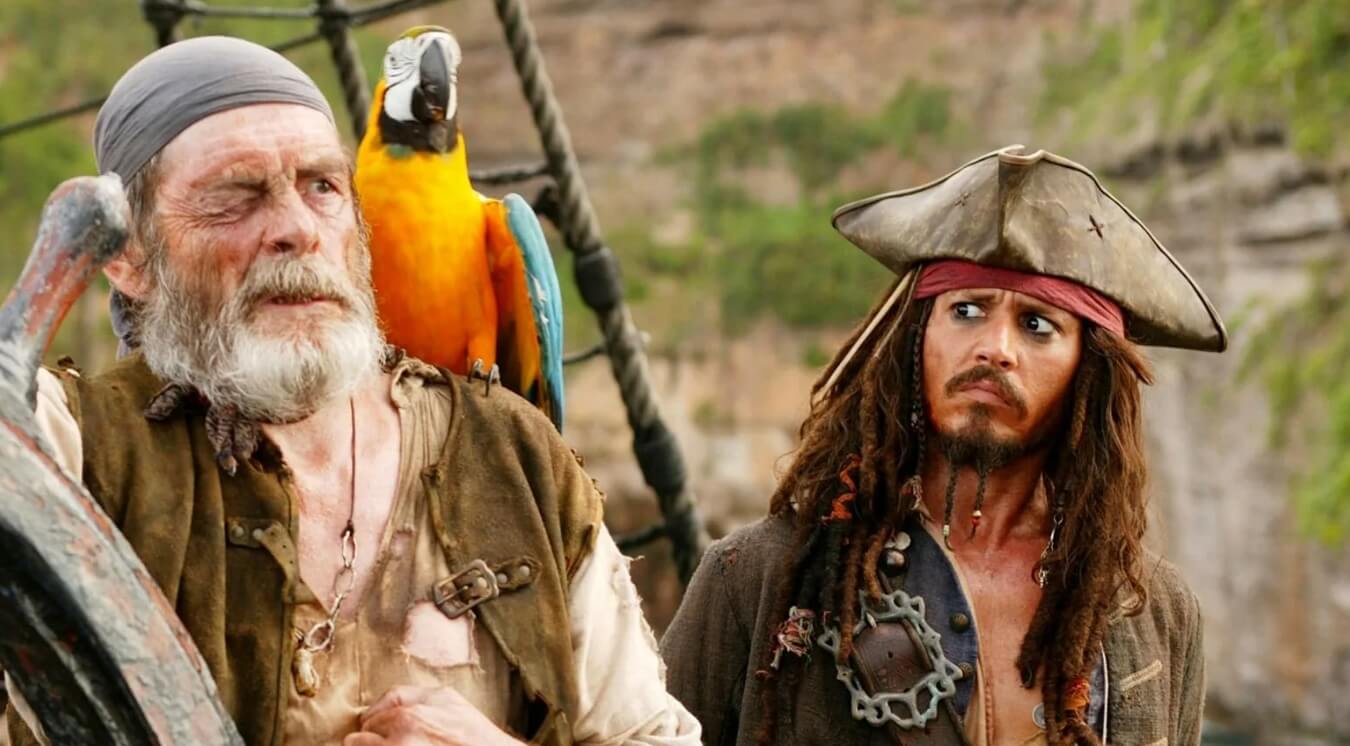 Почему у пиратов были попугаи. Кадр из фильма «Пираты Карибского моря». Фото.