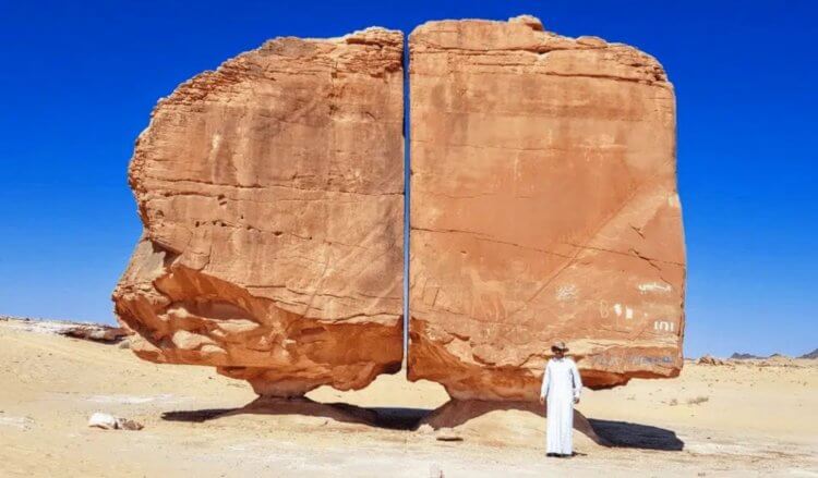 Как можно расколоть камень. Высота Аль-Наслаа по сравнению с ростом взрослого человека. Источник: Geologyscience. Фото.
