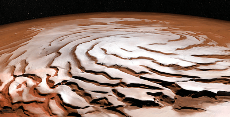 На Марсе обнаружены огромные ледники толщиной 4 километра. На Марсе большое количество льда содержится не только на полюсах. Фото.
