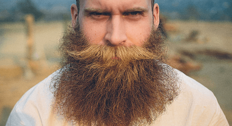 Почему высота голоса влияет на восприятие статуса человека. В разных обществах мужские черты, включая бороду и низкие голоса, имеют разное значение. Фото.