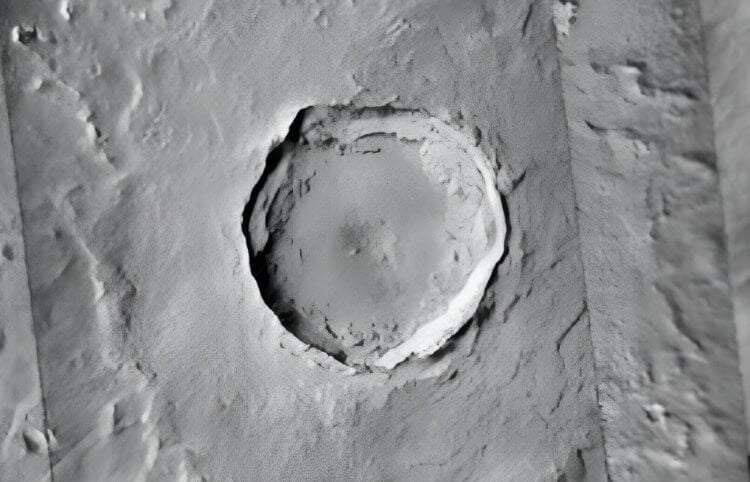 En mystisk asteroid lämnade nästan 2 miljarder kratrar på Mars. Marskratern Corinto. Bild: phys.org. Foto.
