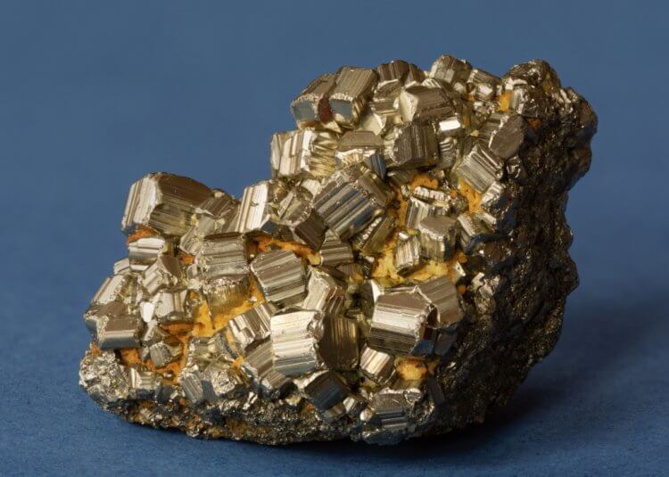 Lithium found in fake 'fool's gold' - could go up in price in the future. Pyrite is a worthless mineral that looks a lot like gold. Image source: theconversation.com. Photo.