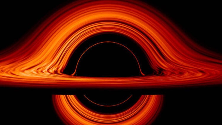 Как черные дыры поглощают материю? Аккреционный диск черной дыры ярко светится. Изображение: images.interestingengineering.com. Фото.