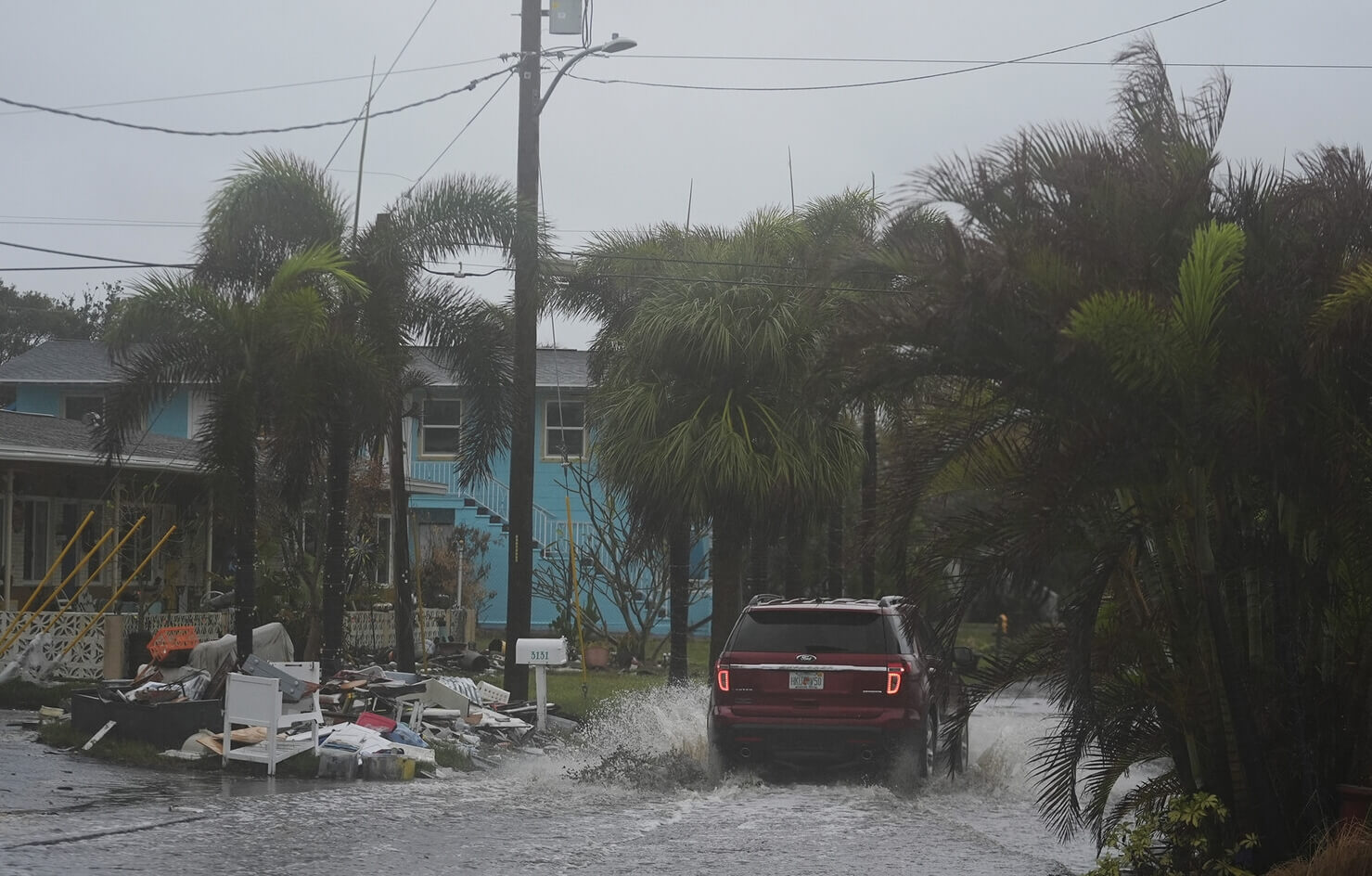 Затопленные улицы флоридского города Галфпорт. Источник фотографии: Associated Press. Фото.